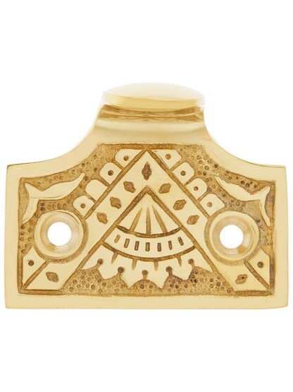 Cast Brass Oriental Pattern Sash Lift In Unlacquered Brass Finish.